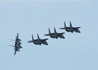 F-15E Strike Eagles breaking formation