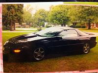 The Z28 in her prime with the SS hood, 2000-2002 SS spoiler, and SS ZR1 rims. Also had GTStyling Headlight and tailight blackouts and the Import Killer decal on the rear.