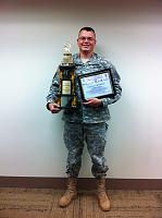 A very proud owner!!! Just recieved the awards his Trans Am won. He was at work on 24 hour staff duty that day.