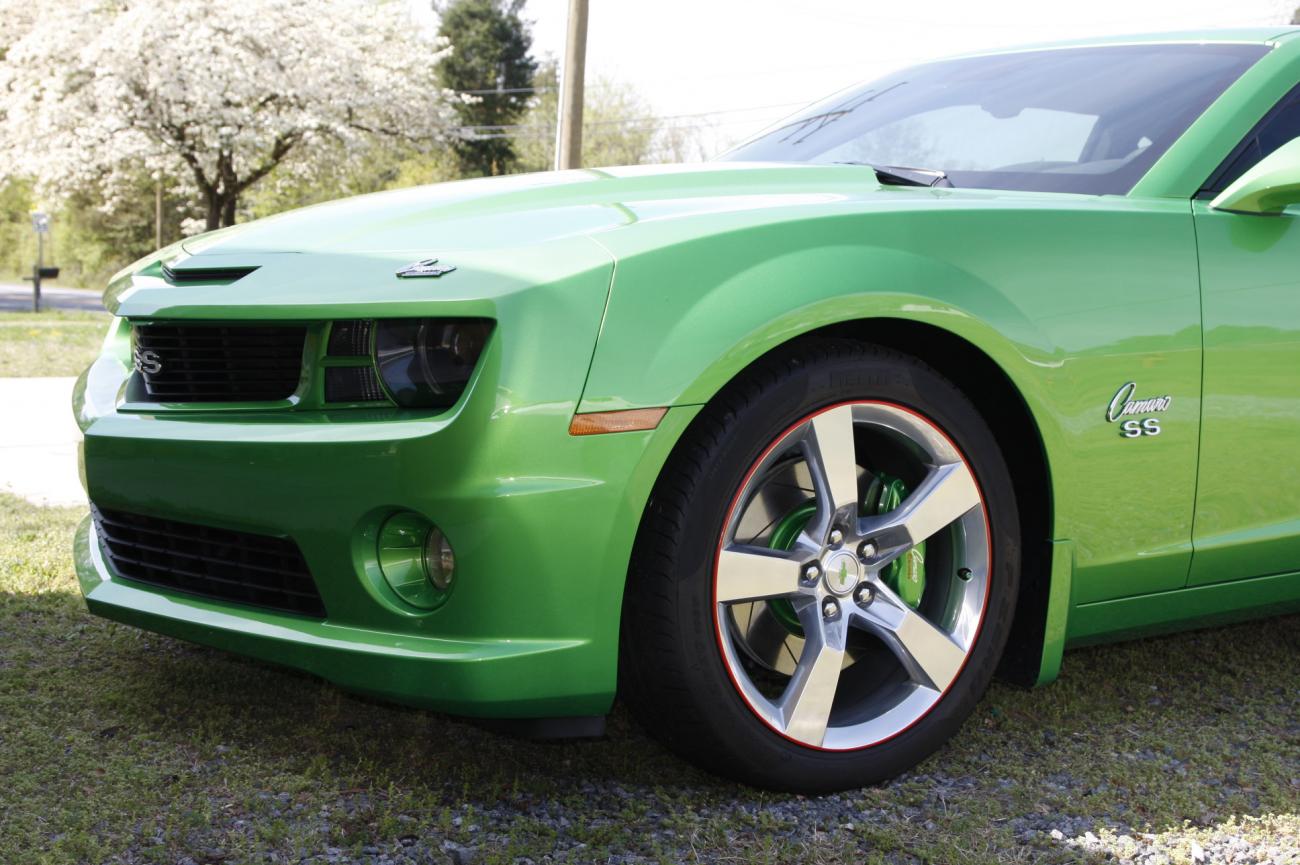 brembo slotted performance rotors, lots of 69 emblems from NPD, pins cut off laser cut 3M adhesive on the back...they are close to 69 placement...painted fog light coves, heritage grill with SS emblem. and some more of this and that