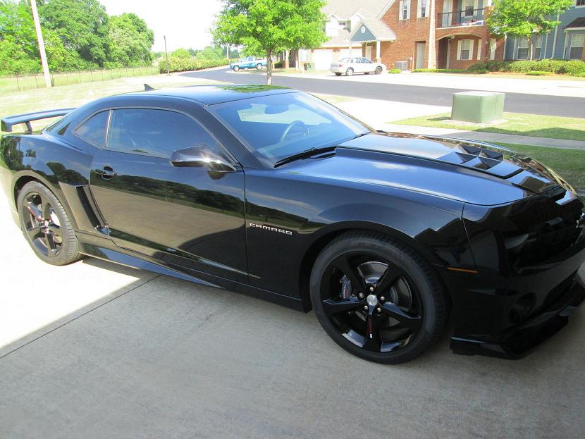 Factory ordered GM Gfx & GM high wing spoiler, Painted gloss black factory rims with decals and clear coat overall. ACS Composite TL1 hood extractor. LED side markers. Ceramic 35% tint.