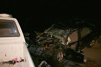 The white truck crossed over into the the wrong lane on a bridge.