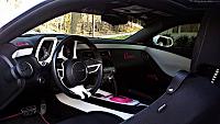 Custom painted white & pink interior with carbon fiber accents