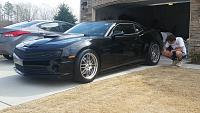 2010 1SS in Black 
LMR Reaper package 
QTP remote cutouts :D 
KW coil overs on all 4 corners