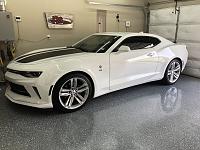 Camaro in garage on floor.