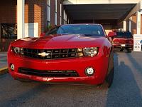 Out side the dealship on the 25th to pickup plates.