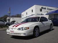 2002 Monte Carlo LS,  flow master exhaust, custom strips and 18" wheels