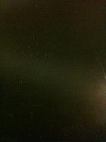 minor amount of green flake in the semi gloss black paint