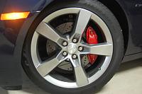 I used Dupli-Color paint to paint the Brembo's.  I do not recommend this paint.  I removed the Calipers and broke them down to parade-rest, hung them and painted.  You will need a better paint brush...