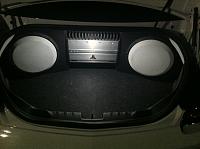 The System 
 
2 JL Audio 12 w3v3 custom painted grilles to match the car and a JL Audio 500/1 Amp