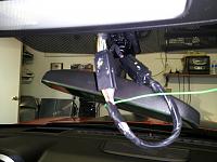 The upper harness attached to the mirror. The PnP harness tucked into the headliner without removing it.  The data wire tucked into the edge of the headliner along the glass to the A-pillar